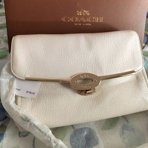 White Coach purse with gold chain strap